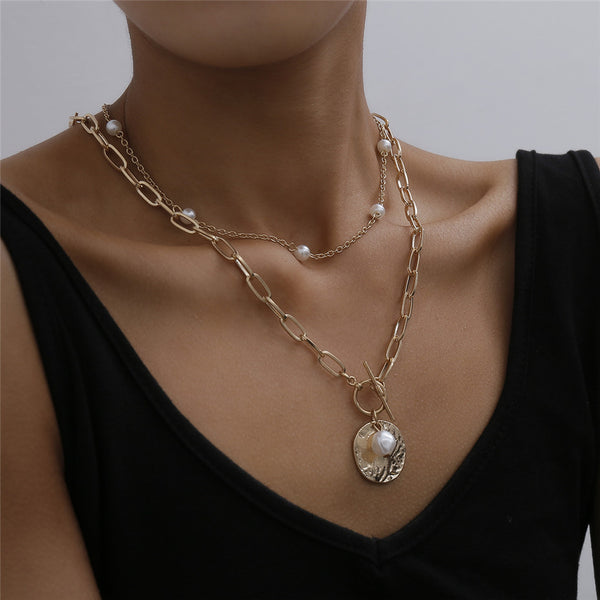 Pearl coin pendant